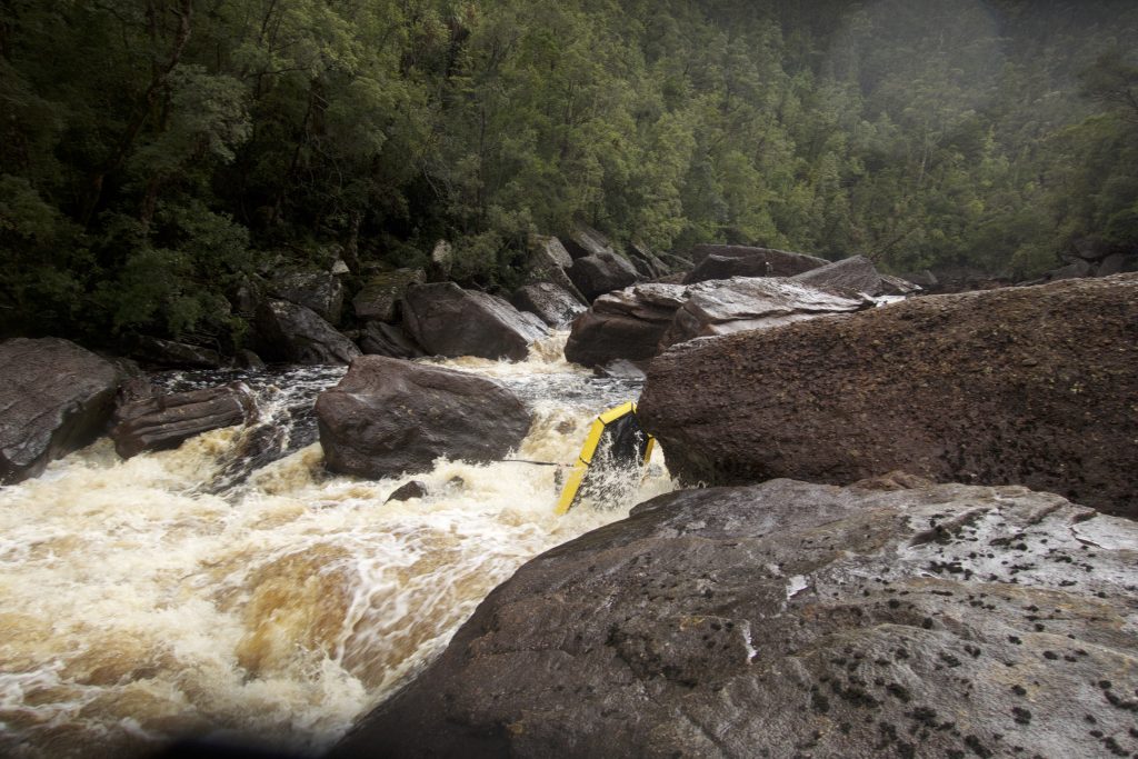 Picture of packraft flipping over backwards