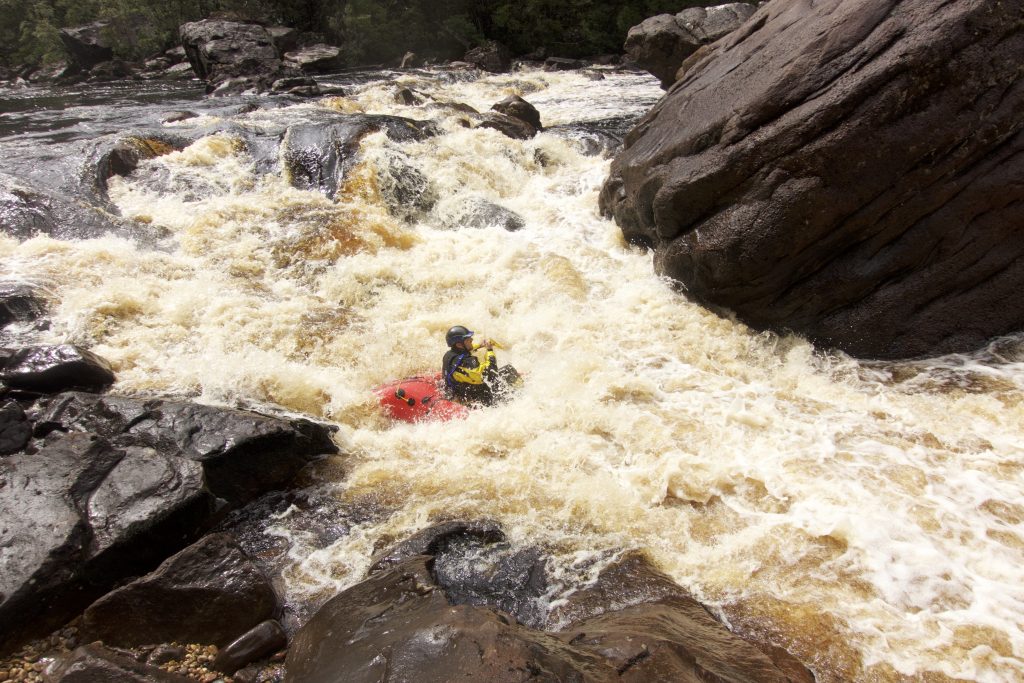 Packraft in rapid